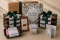 The Family Kitchen Sympathy Essentials gift with six chef-made meals, two desserts, Whittaker's chocolate and a handwritten sympathy card.